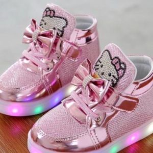 Hello Kitty size 7c girl’s light up tennis shoes.